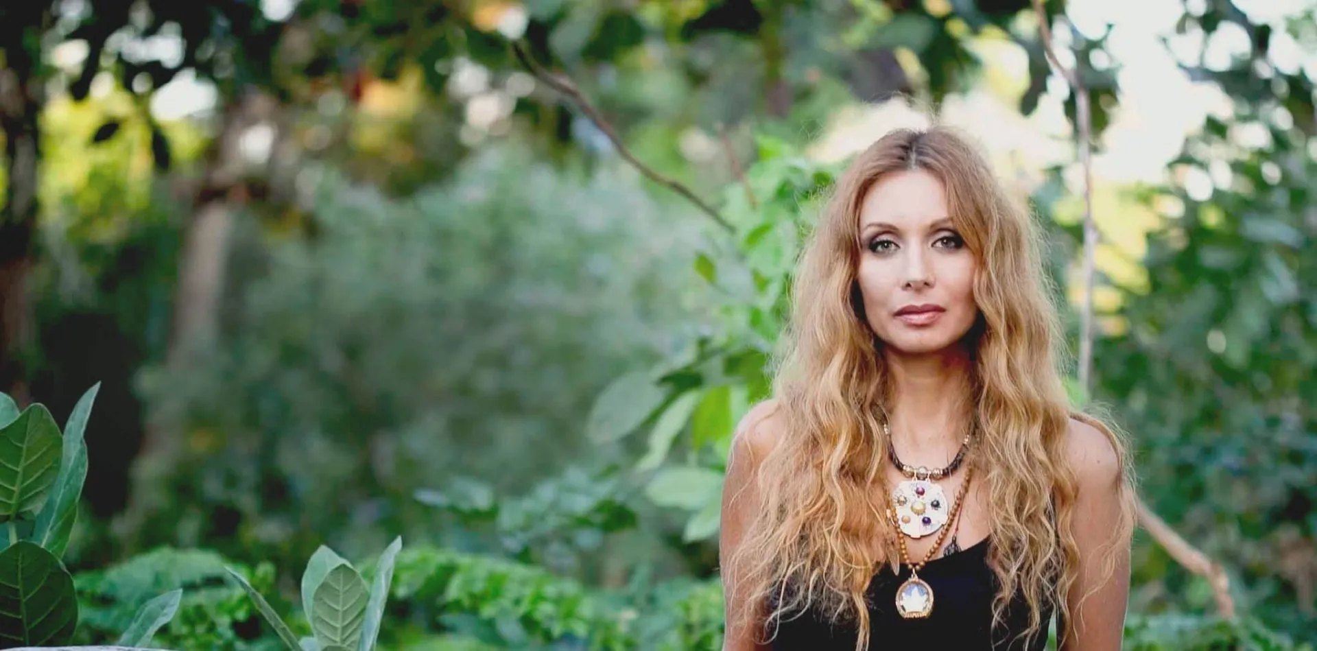 Rozaliya jewelry campaign in a green forest
